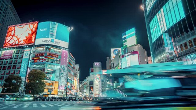Tokyo, Japan - 13 Feb 2025 : Timelapse view of the iconic Shibuya crossing at night in Shibuya City, central Tokyo, Japan.