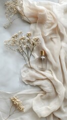 A beautiful bunch of fresh and dried flowers arranged in a basket with a soft floral and natural wedding style