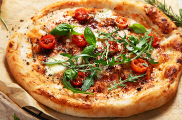 Italian Pizza with fresh mozzarella and basil leaves. Italian Traditional Pizza Margherita..
