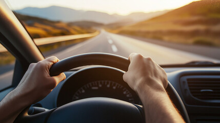 Hands on the wheel driving through an open road at sunset. Symbolizing freedom, travel, and exploration. World Tourism Day theme.