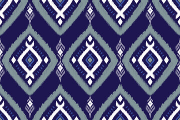 seamless geometric pattern traditional Ikat-inspired geometric design bold diamond motifs deep navy blue background white, gray, and indigo brushstroke textures blurred edges bohemian, tribal