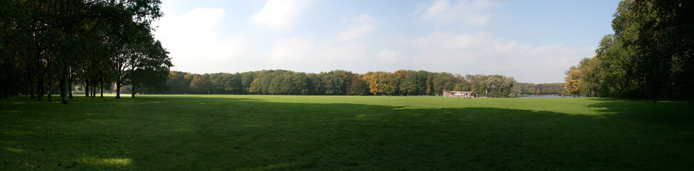 Panoramic view of a picturesque valley in the morning light, fog, meadows and morning light, spring rural landscape