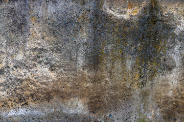 rough concrete wall with black stains - full-frame flat background and texture