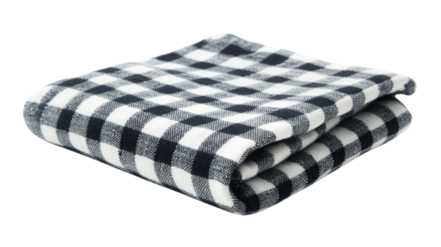 Folded black and white checkered fleece blanket on transparent background