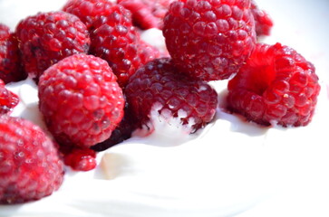 Raspberry. Sweet red raspberries. Juicy raspberries on the table. Fresh Raspberries. Rubus idaeus. Sweet healthy dessert. Fruit dessert.