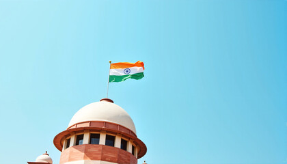 Indian flag waving on the Supreme Court building against a blue sky for blogs, websites, national pride themes, educational content, and cultural awareness presentations