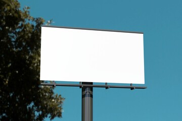 Fototapeta premium Mockup of a outdoor billboard against the evening sky
