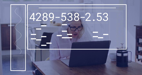 Image of financial data processing over senior caucasian woman using laptop