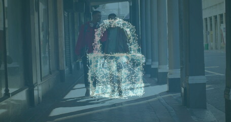 Image of cloud and padlock over biracial male friends walking