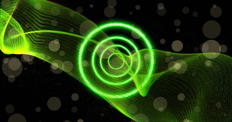 Image of green neon circles and spots of light on black background