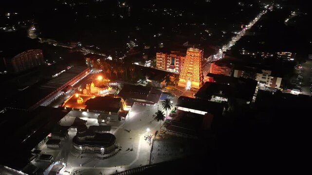 Aerial view of Dehradun city in India during a stunning orange sunset, showcasing rows of residential houses in Dehradun, Uttarakhand. A beautiful city in India, captured in the evening.