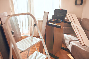 Tools and furniture for assembling in the new apartment.