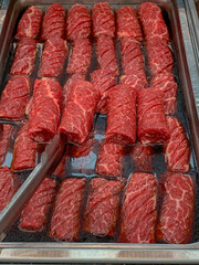 A tray of marinated beef chuck flap tail ready to cook.