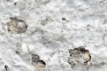 Fototapeta premium Seamless rough textured white wall with rough patches and small holes, showcasing an aged and weathered appearance.