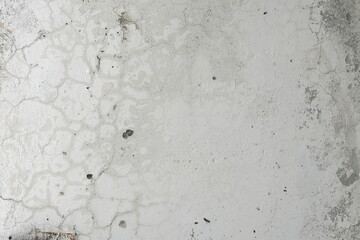 Gray-white wall with imperfections whose surface needs to be repaired