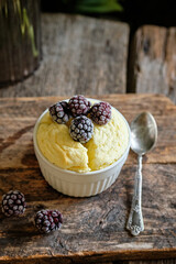 cottage cheese soufflé with berries. wooden background.