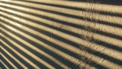 Minimal abstract background wall with shadow reflection . Beautiful texture smooth stucco wall