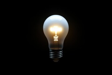 Bright light bulb glowing against a dark background showcasing modern design and functionality