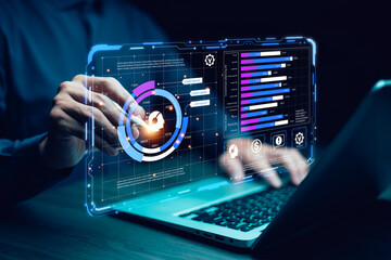 Fototapeta premium Artificial intelligence and data analysis concept. Businessman using AI-powered technology to process big data, generate insights, Futuristic digital transformation in finance and business.