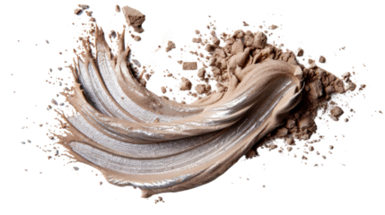 Creamy makeup texture on a dark background with scattered product and a smooth sheen highlighting beauty application