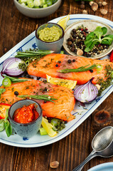 Raw salmon fish and spices.