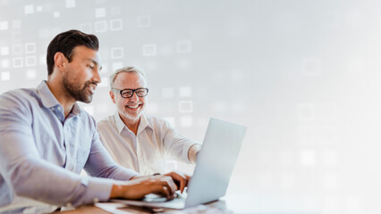 web developers working on a laptop