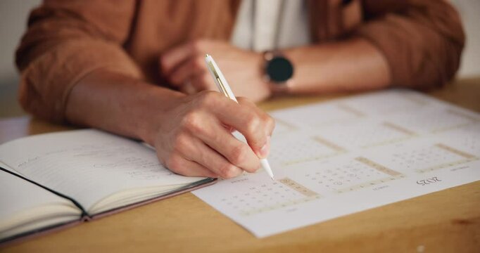 Hand, writing and calendar for schedule, planning and organization with timeline for tasks or event. Priority, agenda and goals with person for productivity, time management and reminder for deadline