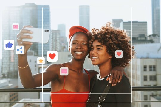 Girls taking a selfie at a rooftop