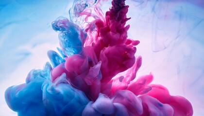 Obraz premium Smoke and ink diffusion in water, with vibrant pinks and blues blending in an abstract, fluid motion. The colors swirl together, creating a mesmerizing and dynamic visual effect. 