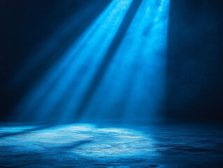 Obraz premium Mystical Beams: Dramatic blue light beams cut through a hazy atmosphere, illuminating an empty stage or surface, casting shadows. The scene evokes a sense of mystery, anticipation.