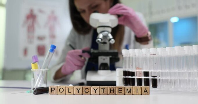 A diligent researcher is examining various blood samples meticulously under a microscope to investigate polycythemia