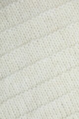 Knitted fabric background, close-up view