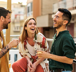 woman man rooftop friend youth young party friendship talking fun happy outdoor group drink...