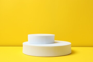 White podims on a yellow background