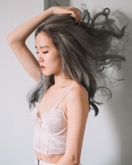 Fototapeta premium Ethereal Asian woman with gray hair