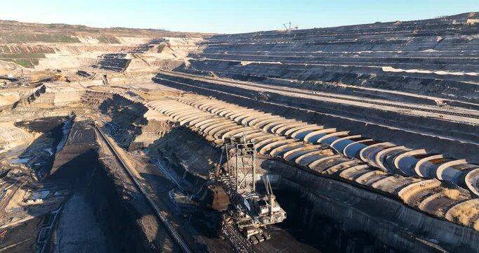 Tagebau Hambach, bucket wheel excavator at work. Extraction of brown coal, lignite for energy production. Aerial views.