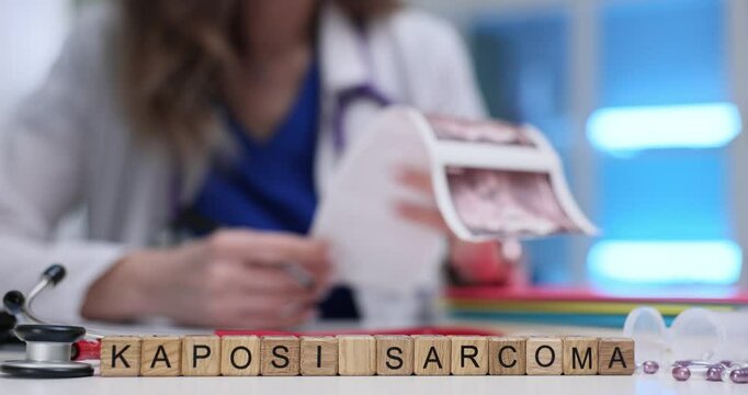 A dedicated healthcare worker meticulously examines critical documents related to Kaposi Sarcoma in a clinical setting
