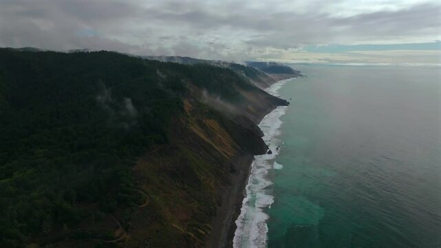 USAL Beach Sinkyone Wilderness Lost Coast Trail Northern California aerial drone rugged untouched coastline mist rain morning remote untouched waves crashing bluffs mountainside AWD 4WD track backward