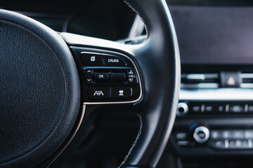 Fototapeta premium Salon of a modern and youth electric car. Fast charging port. Interior details.