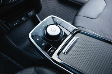 Obraz premium Salon of a modern and youth electric car. Fast charging port. Interior details.