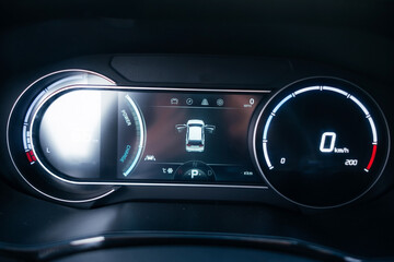 Salon of a modern and youth electric car. Fast charging port.  Interior details.