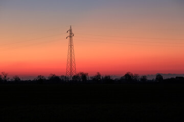 Pylon electricity sun sunset disk solar silhouette