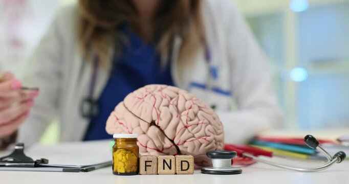 An insightful medical scene featuring a brain model along with various health tools placed on a table