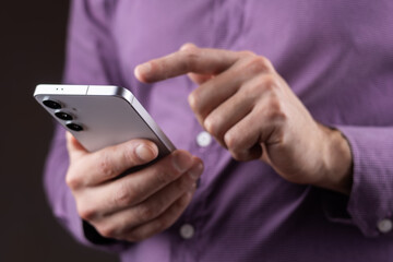 businessman working at the office for investment analyzing company financial report balance with smart phone.