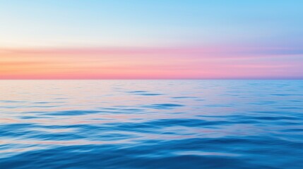 Obraz premium Serene ocean horizon at sunset with soft pastel sky and calm waves. Tranquility and relaxation