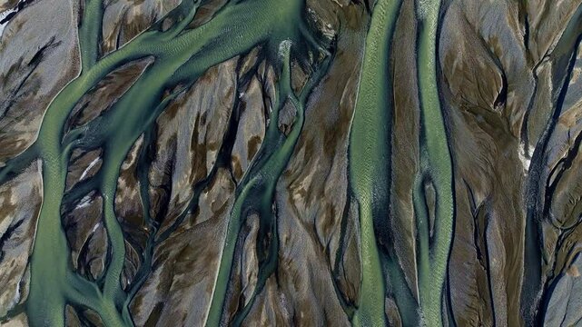 Abstract River Veins Of Iceland Carving Through Volcanic Terrain