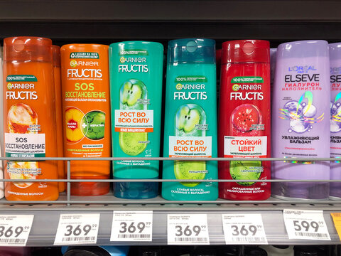 Shampoo &ldquo;Fructis&rdquo; with prices on the shelf in the supermarket.