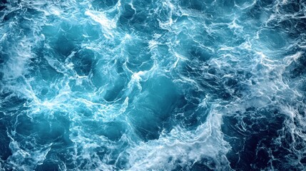 Fototapeta premium Top-down view of choppy ocean waves. Possible use Stock photo for nature, travel, or adventure themes