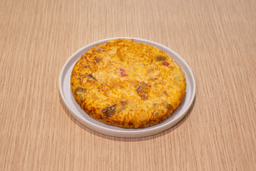 A plate of food with a yellowish brown color