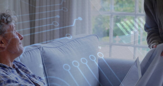 Image of data processing over senior caucasian couple smiling at home